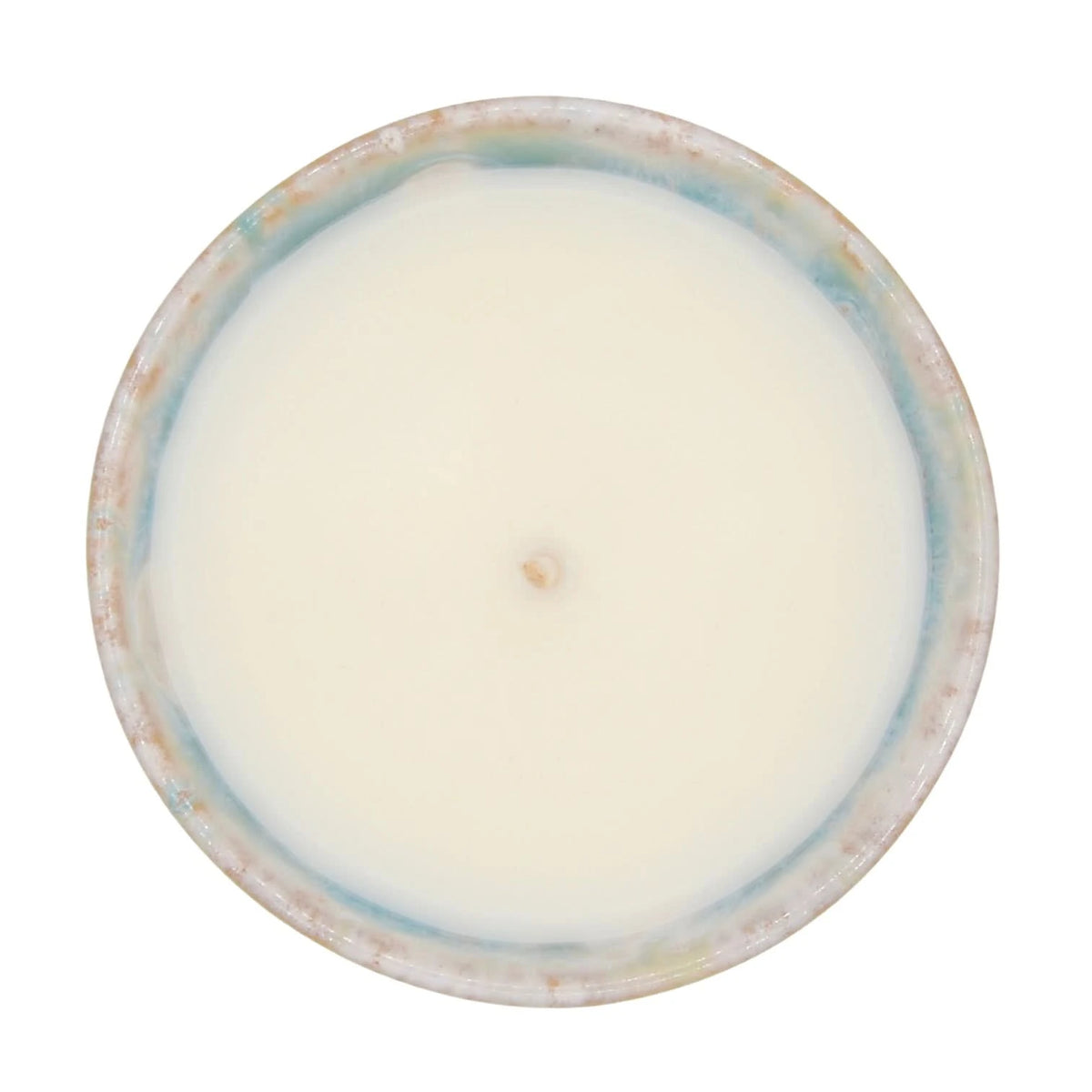 Bougie parfumée thé vert de La Bougie Herbivore dans un pot aux teintes naturelles