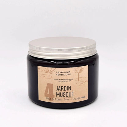 Bougie fleur de lotus et musc de La Bougie Herbivore dans un pot noir élégant de 400g