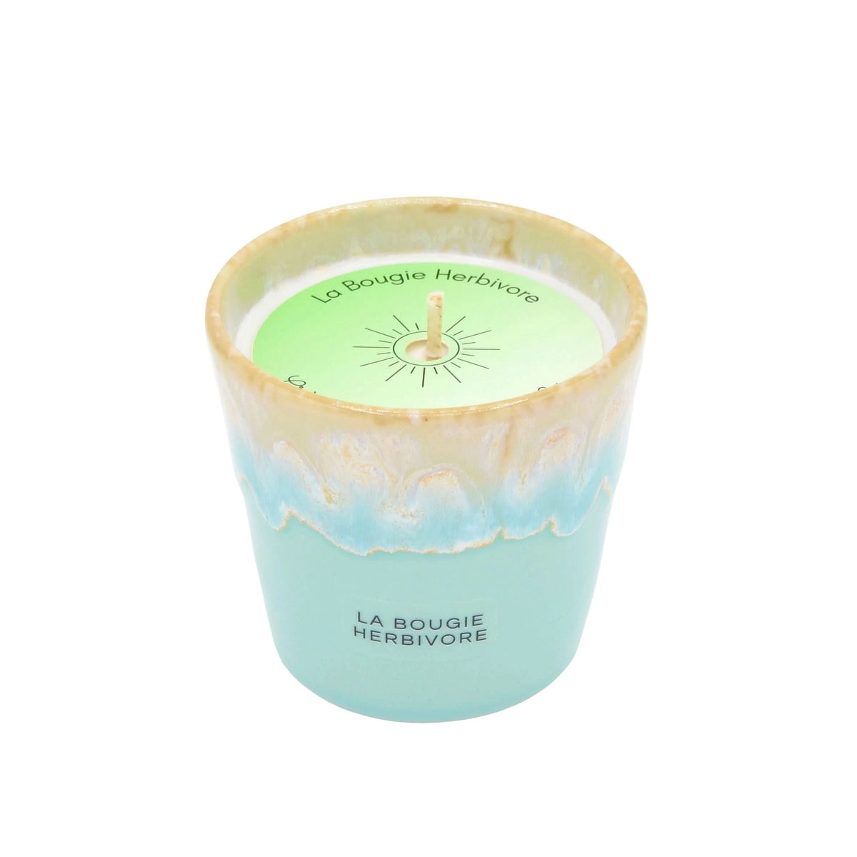 Bougie parfumée crème de concombre de La Bougie Herbivore dans un pot coloré avec un design élégant