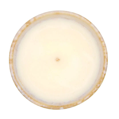 Bougie parfumée lys blanc de La Bougie Herbivore, couleur crème dans un contenant élégant